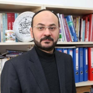 Speaker at Conference - Erdogan  Kucukoner